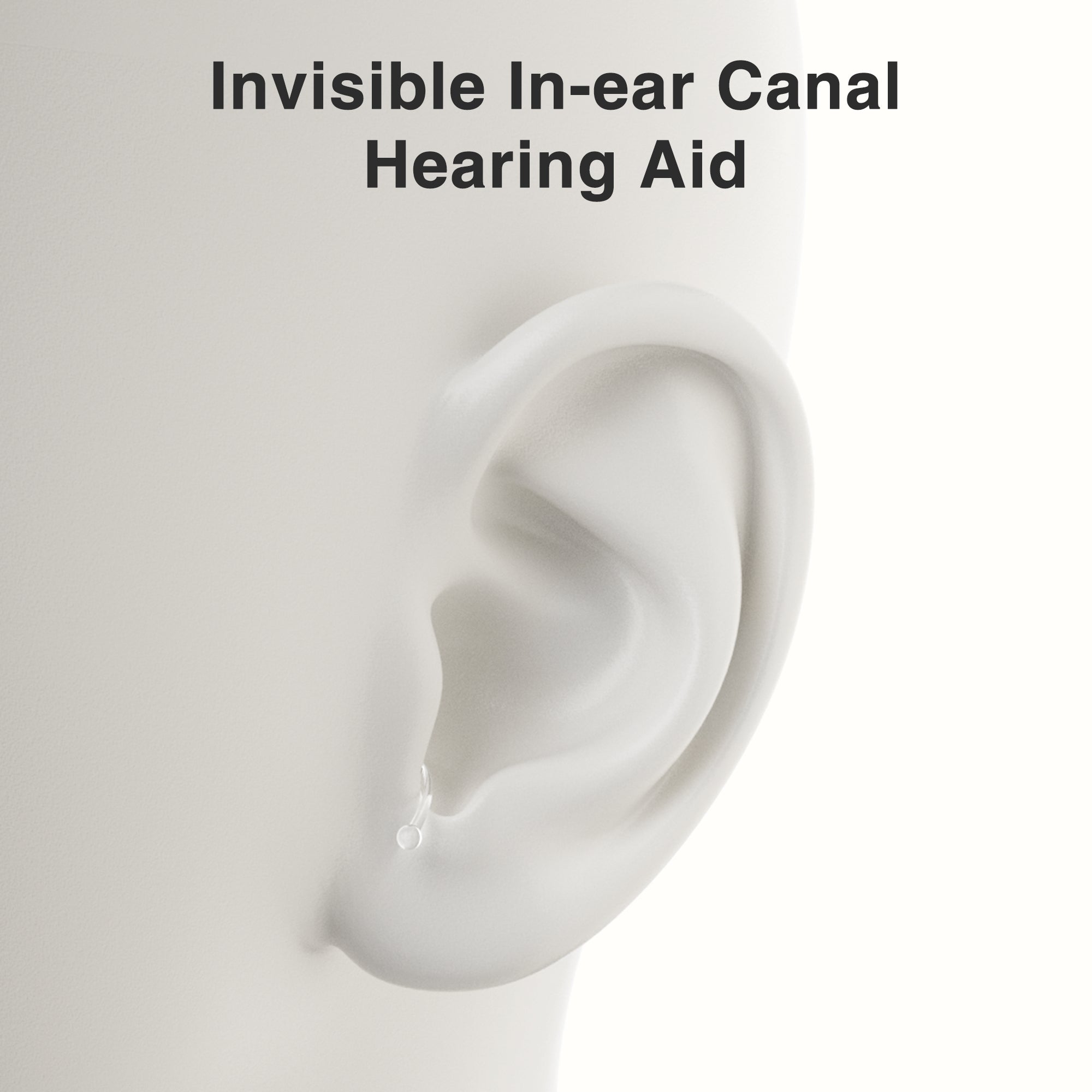 Invisible in-ear canal hearing aid on a white ear model with a plain background