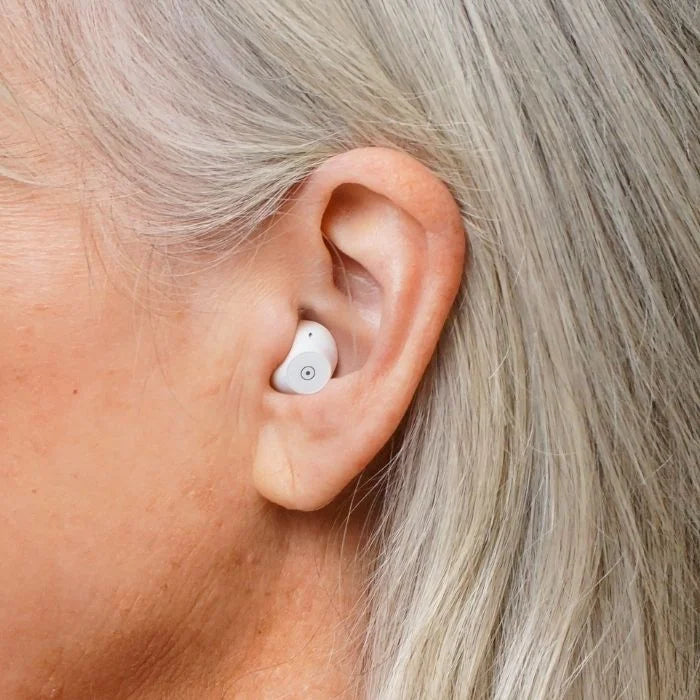 Ceretone Fusion in the canal  over the counter hearing aid on ear discreet look.