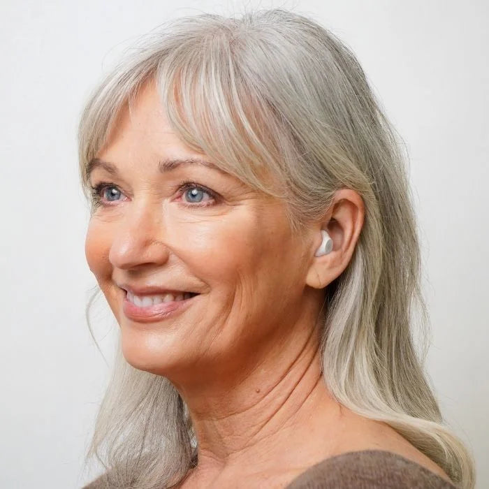 Side profile view of Ceretone Fusion OTC hearing aids, designed for a discreet ear bud look.